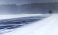 Winter. Blizzard snowstorm winter road of a snowy landscape. On the road there are no car Royalty Free Stock Photo