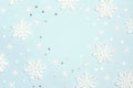 Winter blue background with frame of snowflakes and copy space Royalty Free Stock Photo