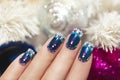 Winter blue manicure. Royalty Free Stock Photo