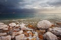 Winter. Blue storm cloud on the Dead Sea Royalty Free Stock Photo