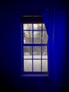 Winter Blues behind a window icy trees Royalty Free Stock Photo