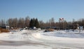 Winter boats parking - boats on trailers, wind direction indicator Royalty Free Stock Photo