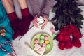 Winter breakfast in bed with red roses and heart of striped lollipop Royalty Free Stock Photo