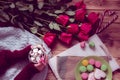 Winter breakfast with red rose and heart of striped lollipop Royalty Free Stock Photo