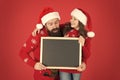 Winter bucket list. Christmas celebration schedule. Christmas party timing. Father daughter blackboard copy space. Get Royalty Free Stock Photo