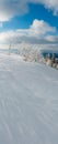 Winter calm mountain landscape with beautiful frosting trees and snowdrifts on slope Carpathian Mountains, Ukraine. Composite Royalty Free Stock Photo