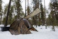 Winter camping in a snowy forest. Winter landscape with a tent Royalty Free Stock Photo