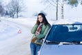 Winter car breakdown - woman call for help