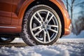 Winter car tire. Snow driving equipment. Generative Ai Royalty Free Stock Photo