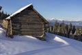 Winter Carpathian Mountains, Chornohora region, Ukraine. Wooden shepherds cradle on the meadows in the Carpathians in winter. Wint Royalty Free Stock Photo