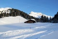 Winter Chalet House at the Mountains in Lech am Arlberg with Road, Austrian Alps