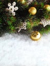 Winter Christmas background. Christmas boarder with fir tree branch with cones on the snow. Winter holidays concept. Royalty Free Stock Photo