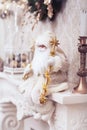 Winter Christmas decoration, Xmas white Santa with golden stick. Royalty Free Stock Photo