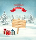 Winter christmas landscape with a wooden ornate sign background.