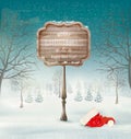 Winter christmas landscape with a wooden ornate sign and a santa