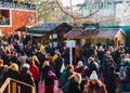 London, UK/Europe; 21/12/2019: Winter Christmas market in Southbank, London. People eating, drinking and having fun with friends Royalty Free Stock Photo