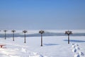 Winter Christmas, New Year landscape of a snow covered river and Ãâ¢mbankment with vintage metal lanterns, Dnepropetrovsk, Dnipro Royalty Free Stock Photo