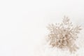 Winter, Christmas, New Year's Snowflake Ornament in Snow Royalty Free Stock Photo