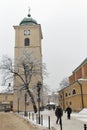 Winter church clock tower on Farny Square in Rzeszow, Poland