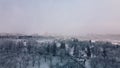 Winter city garden.  Trees in the snow. Flying over a snow-covered park. Aerial photography Royalty Free Stock Photo