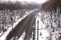 Snow-covered railway and forest Royalty Free Stock Photo