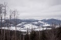 Winter cloudy landscape of the Carpathian Mountains in Eastern Europe Royalty Free Stock Photo