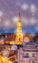 winter in Cluj-Napoca, Saint Michael church in snowfall - winter holiday destination, Romania Royalty Free Stock Photo