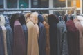 Winter coats hanged on a clothes rack