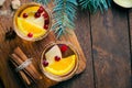 Winter Cocktail, Christmas Sangria with Apple Slices, Orange, Cranberry and Spices, Refreshing Drink Royalty Free Stock Photo