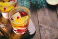 Winter Cocktail, Christmas Sangria with Apple Slices, Orange, Cranberry and Spices, Refreshing Drink Royalty Free Stock Photo