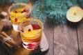 Winter Cocktail, Christmas Sangria with Apple Slices, Orange, Cranberry and Spices, Refreshing Drink Royalty Free Stock Photo