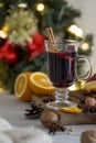 Christmas red mulled wine in glass on wood board at white background Royalty Free Stock Photo