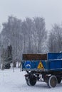 Winter Construction Site in City While Tractor Undeground Replacement With Road Sign Royalty Free Stock Photo