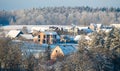 Winter countryside, frosty trees and houses of the village Royalty Free Stock Photo