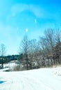 winter covered road moon daylight Royalty Free Stock Photo