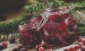 Winter cranberry sauce in glass jars with fresh cranberries, dec