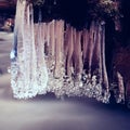 Winter creek with icicles above freeze mountain stream. Winter season Royalty Free Stock Photo