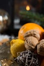 Winter cristmas fruits and nuts on silver plate Royalty Free Stock Photo