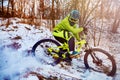 Winter cycling. Extreme riding on a mtb, mountain bicycle in the snow Royalty Free Stock Photo