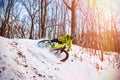 Winter cycling. Extreme riding on a mtb, mountain bicycle in the snow in the winter forest Royalty Free Stock Photo