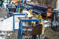 Winter day, empty tables with empty chairs at a local outdoor resturant in Bucharest, Romania, 2021