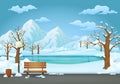 Winter day park. Snow covered wooden bench, trash bin and street lamp with a frozen river and snowy mountains. Royalty Free Stock Photo