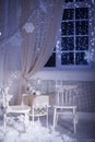 Winter decoration. Table for romantic dinner for two. Royalty Free Stock Photo