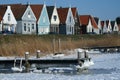 Winter in Durgerdam with frozen pond and colourful wooden houses Royalty Free Stock Photo