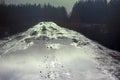 Winter dirt way glitters in ambient light Royalty Free Stock Photo