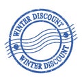 WINTER DISCOUNT, text written on blue postal stamp Royalty Free Stock Photo