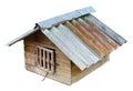 The winter dog house has a roof made of wavy slate and a lattice Royalty Free Stock Photo