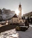 Winter dolomites church sunset