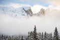 Winter Dolomites at foggy sunset