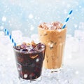 Winter drink iced coffee in a glass and ice coffee with cream in a tall glass